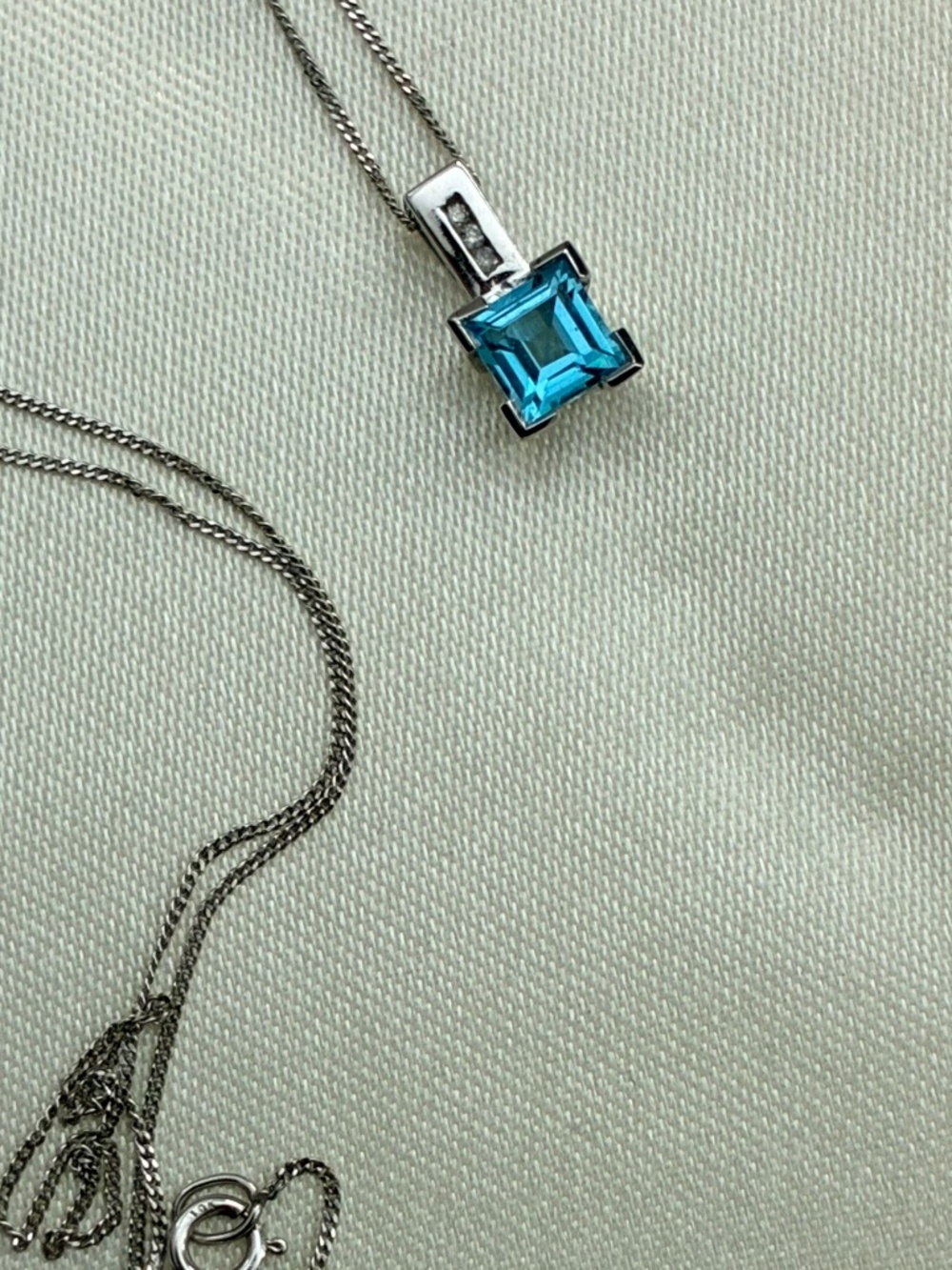 White gold 10k topaz and diamond pendant necklace